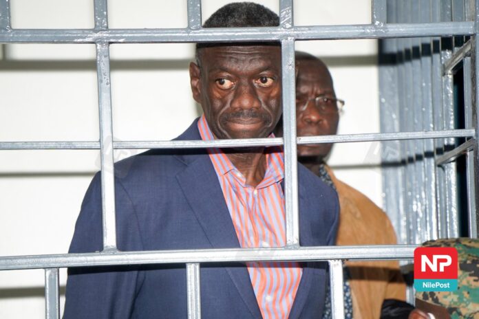 WhatsApp-Image-2024-11-20-at-2.00.34-PM Military Court Keeps Dr Besigye in Luzira Dr Kizza Besigye in a caged dock inside the court martial in Makindye